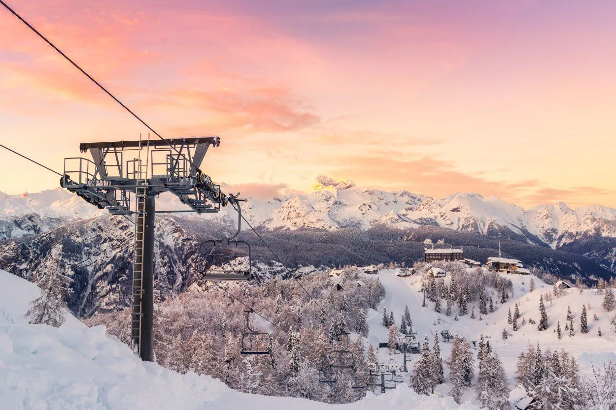 Ski lift and beautiful sunset sky
